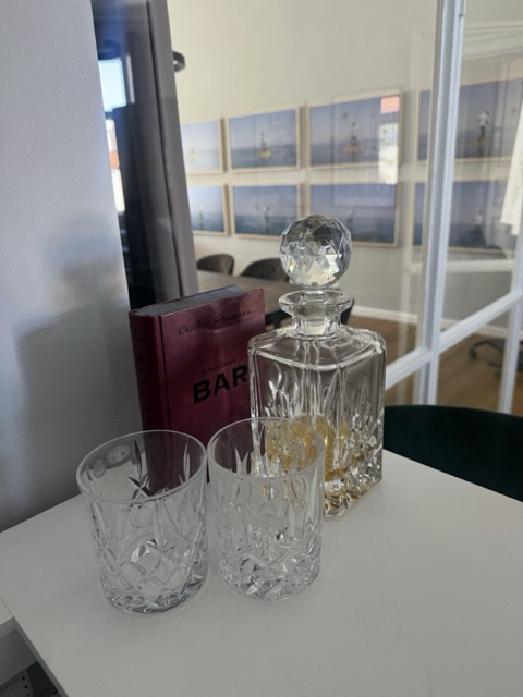 Crystal decanter and glasses on the office bar